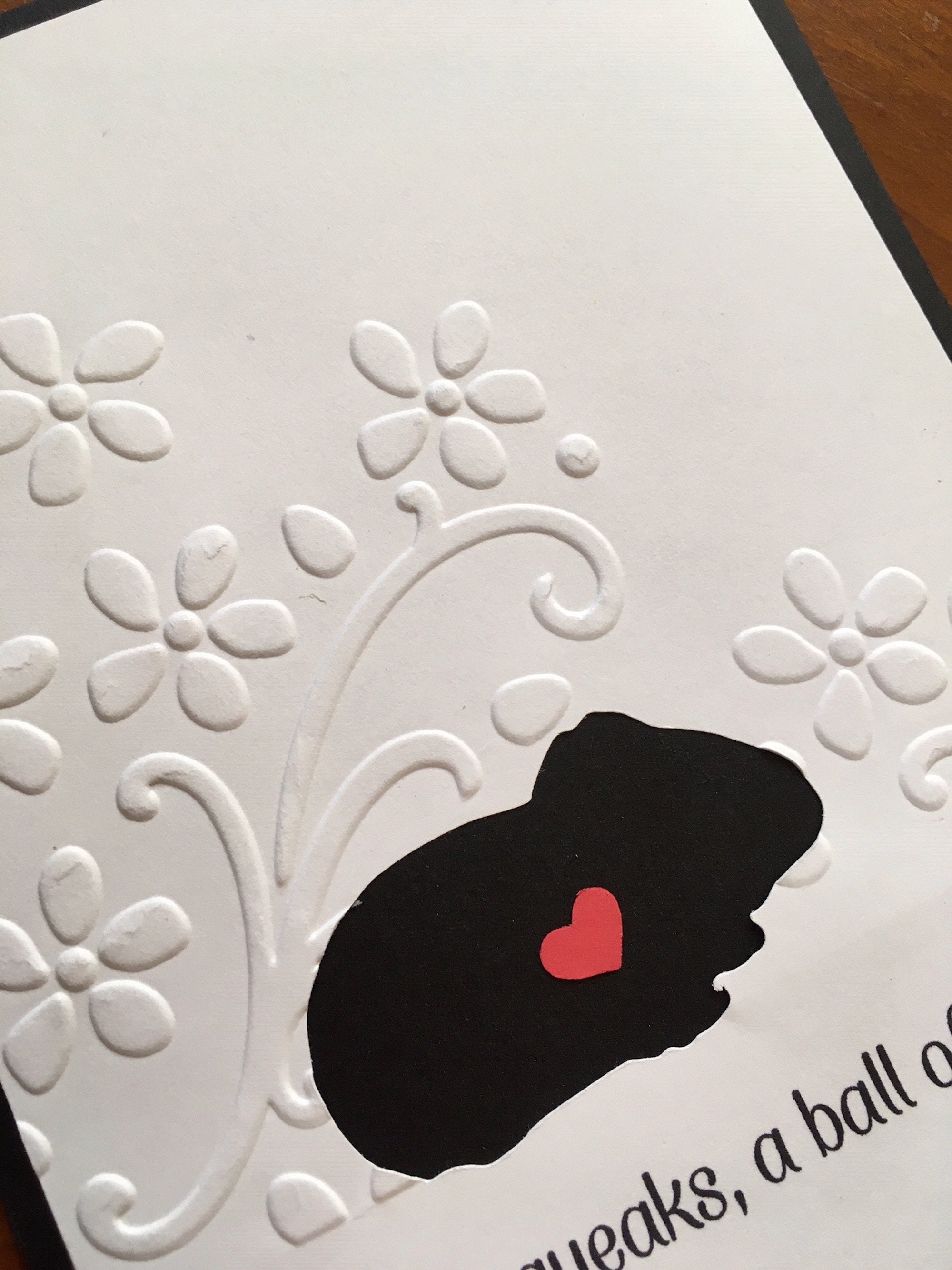 Handmade pet loss sympathy card featuring a guinea pig design with heartfelt condolence message